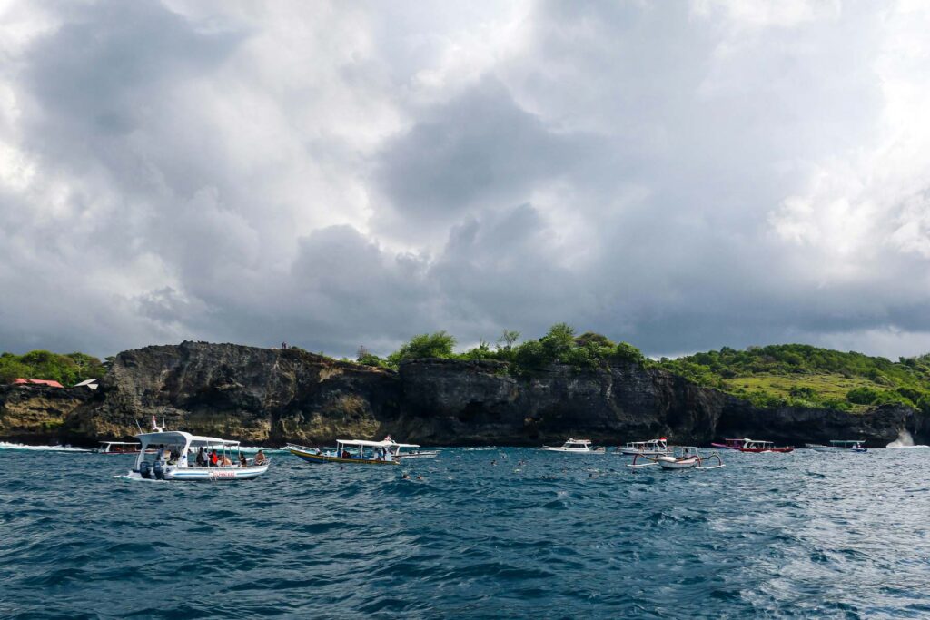 Padang Bai coast with traditional fishing boats near Blue Lagoon Bali.