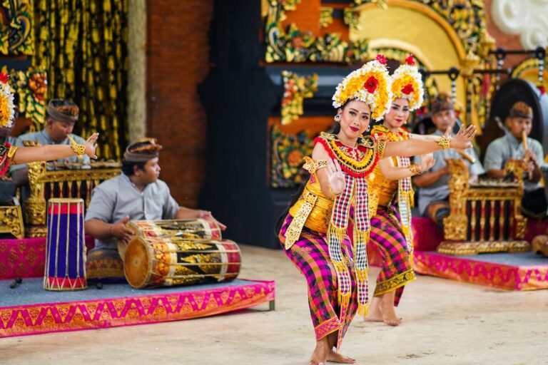 Balinese dance with a local teacher in a traditional setting.